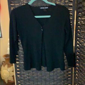 Beautifully made 3/4 sleeve waist high cardigan.